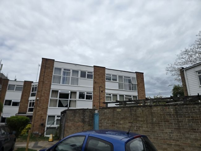 Cleaning cladding on a commercial building in Hertford